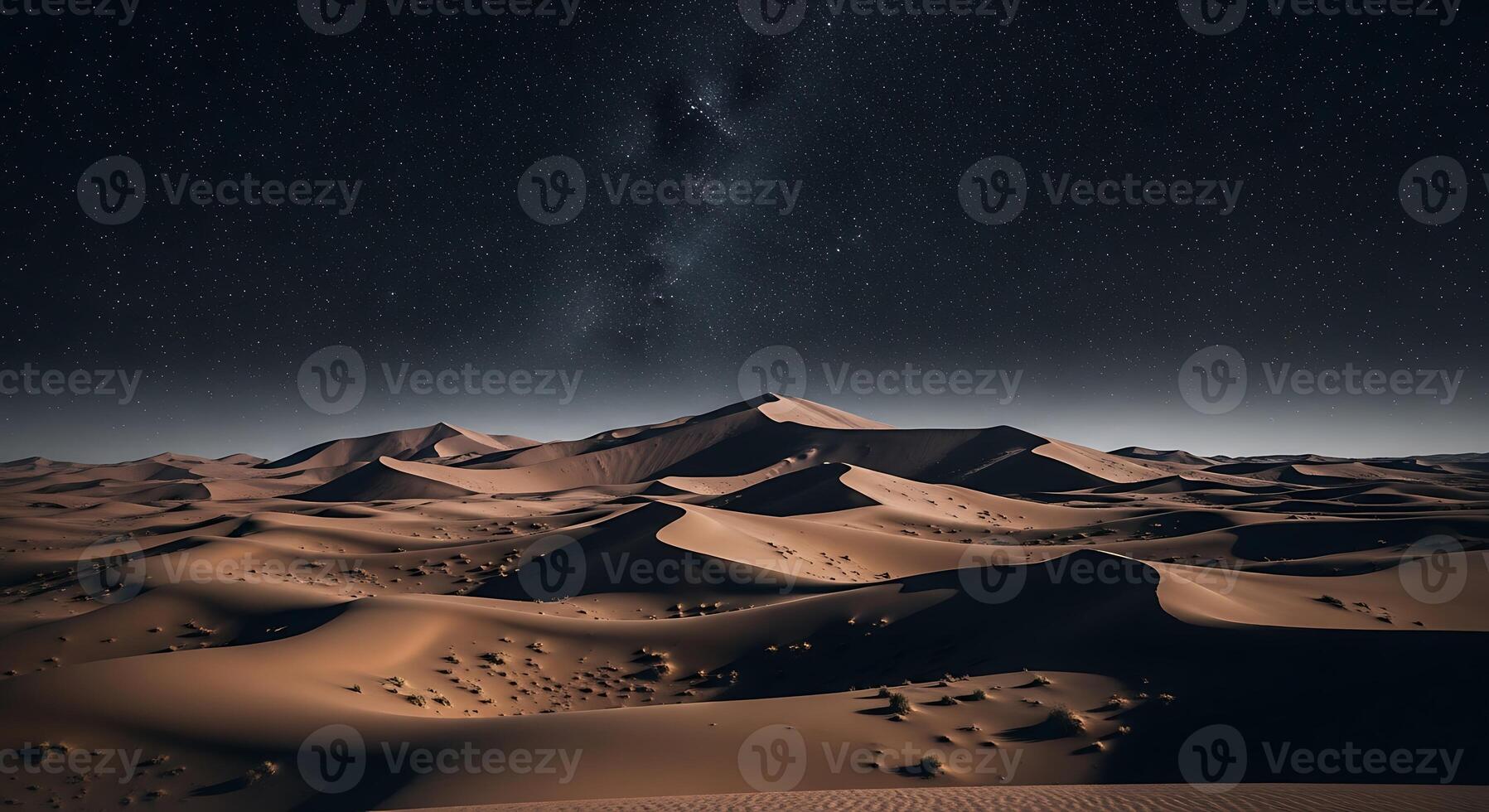 Desert landscape under a starry sky photo