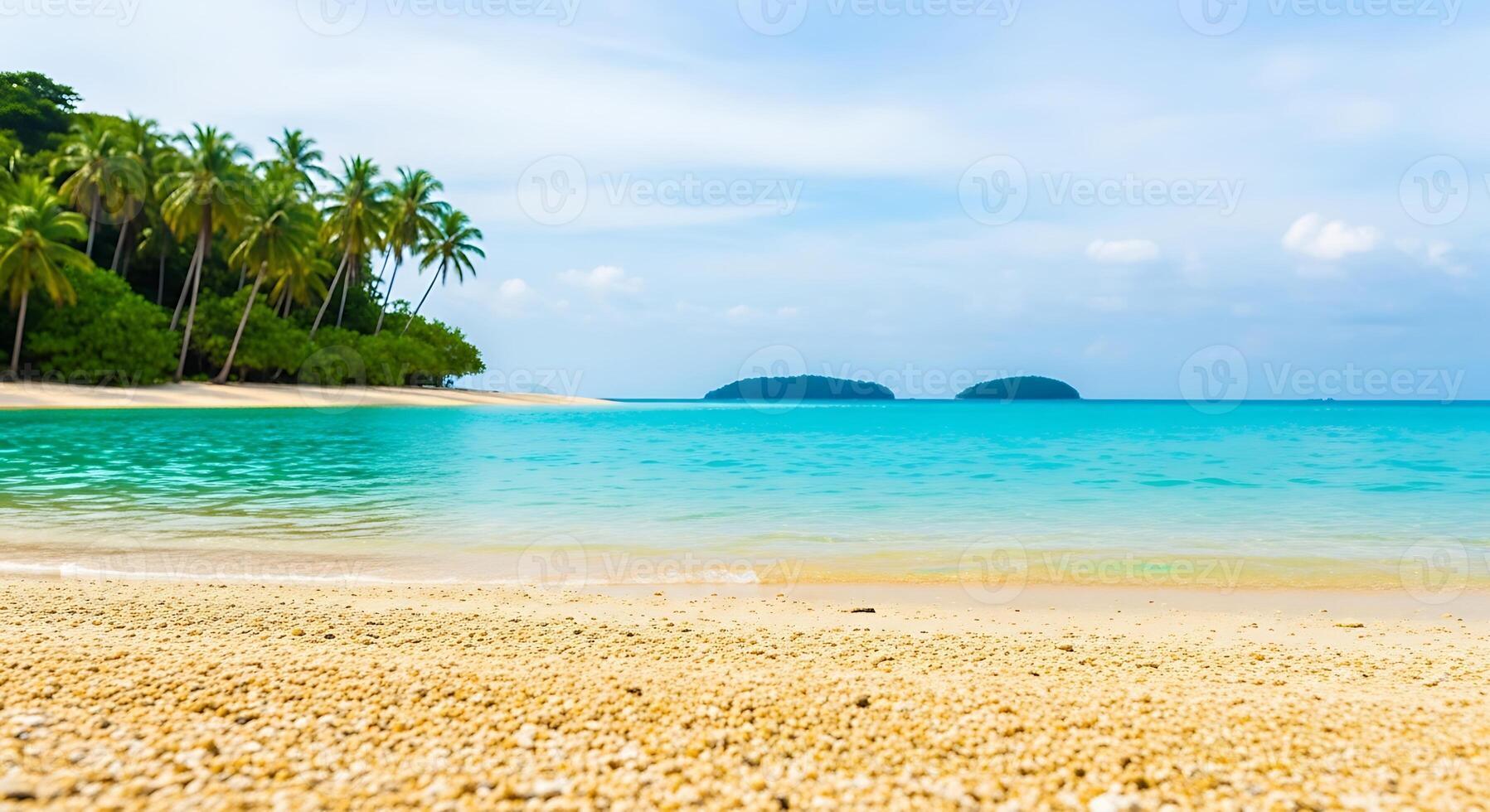 Beautiful Tropical Beach Paradise With Turquoise Water Palm Trees and Sandy Shoreline Under Blue Sky photo