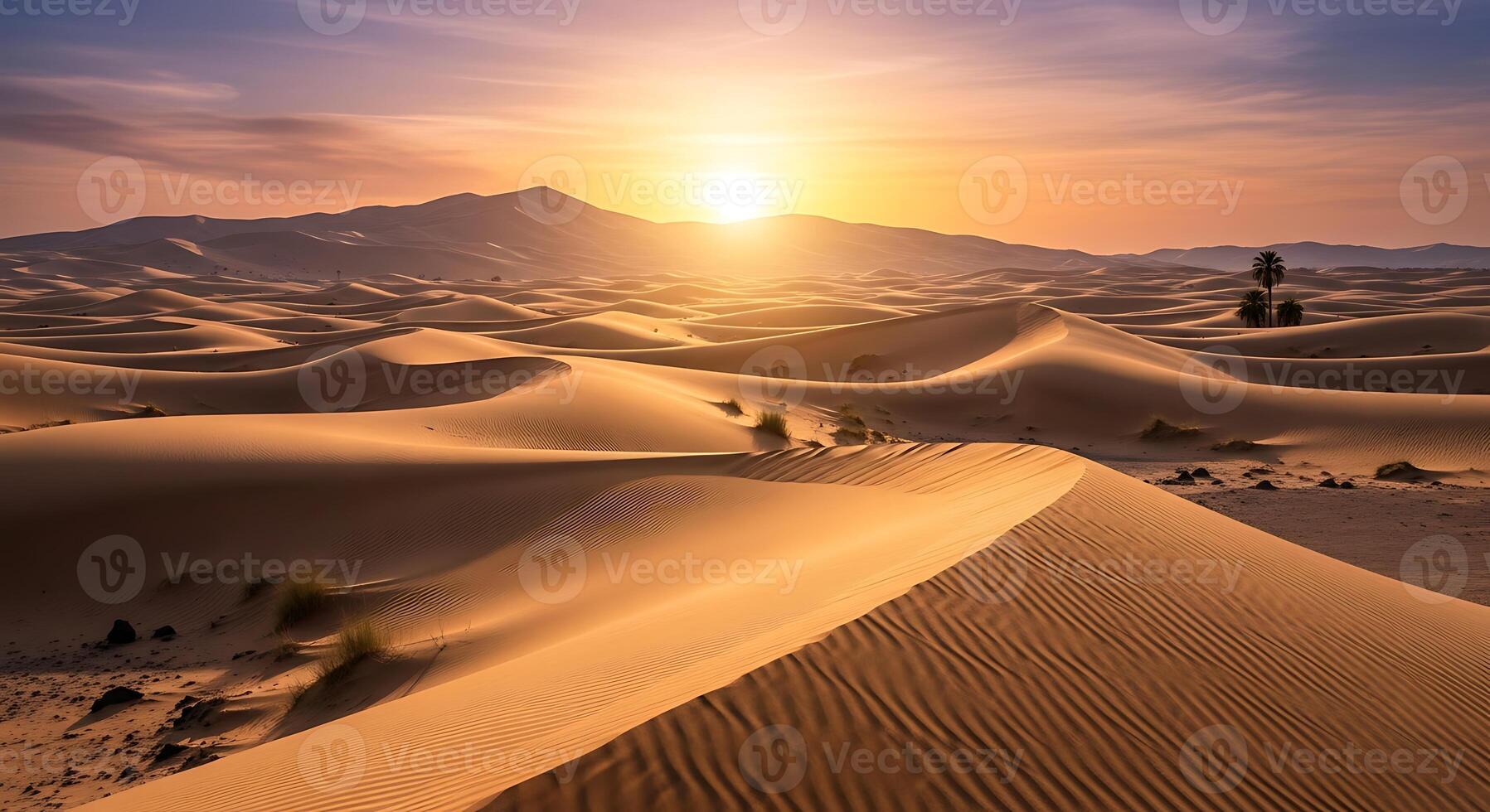 Golden desert landscape at sunrise with rolling sand dunes and distant mountains under a vibrant sky photo