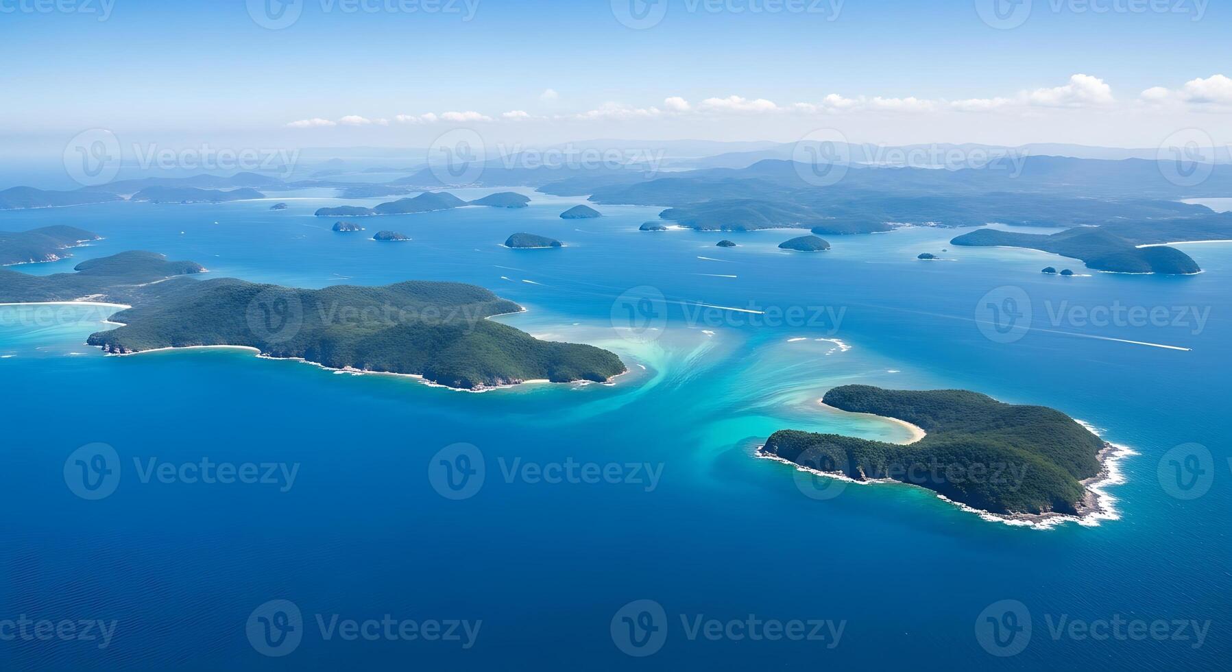 Stunning Aerial View of Tropical Islands with Turquoise Waters and Lush Greenery photo