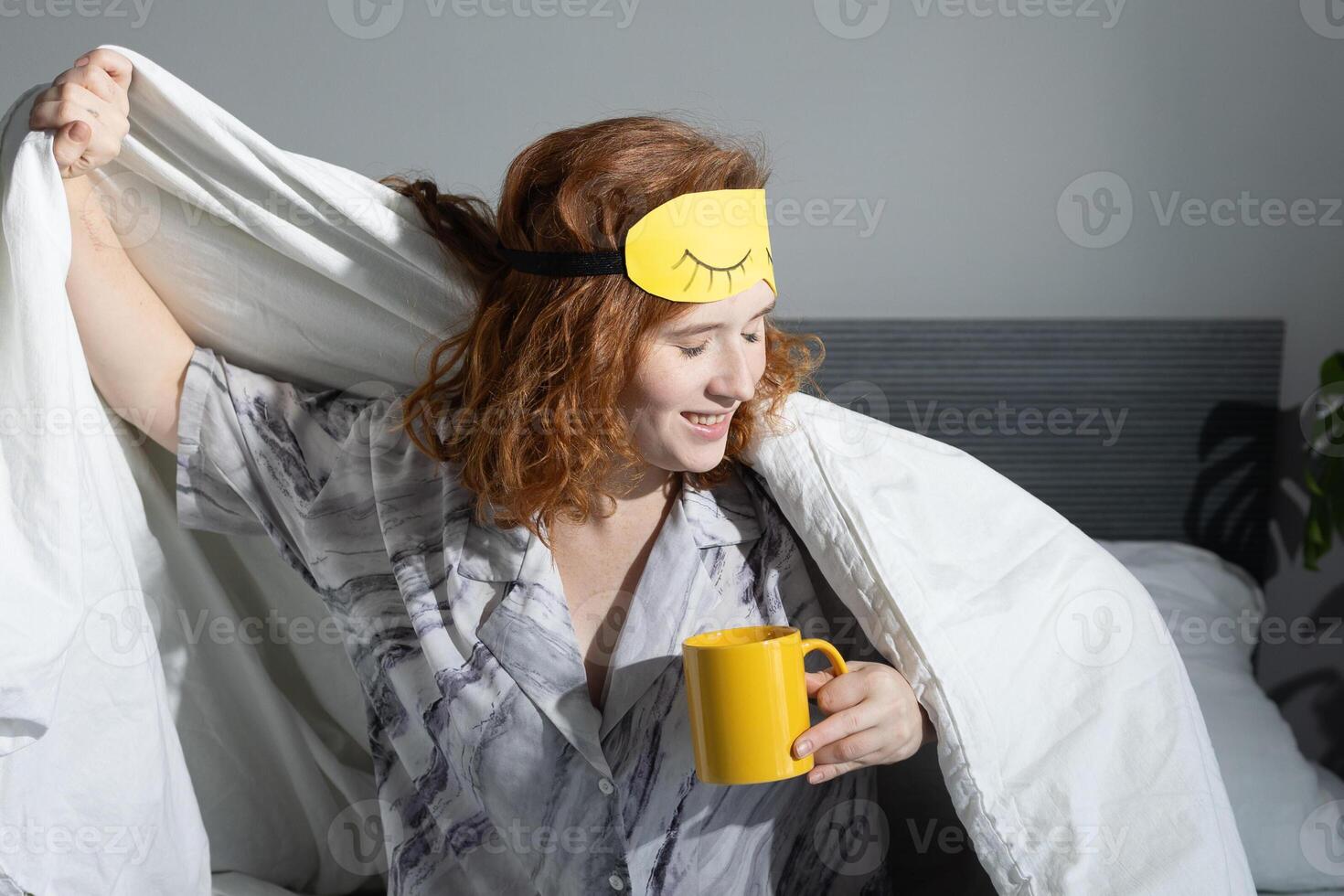 Enjoying a Cozy Morning Routine with a Warm Cup of Coffee and a Soft Sleep Mask on photo