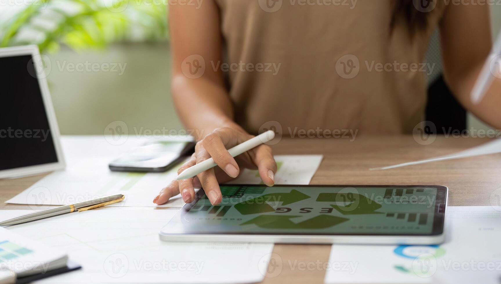 ESG sustainability analysis with digital tools and renewable energy focus photo