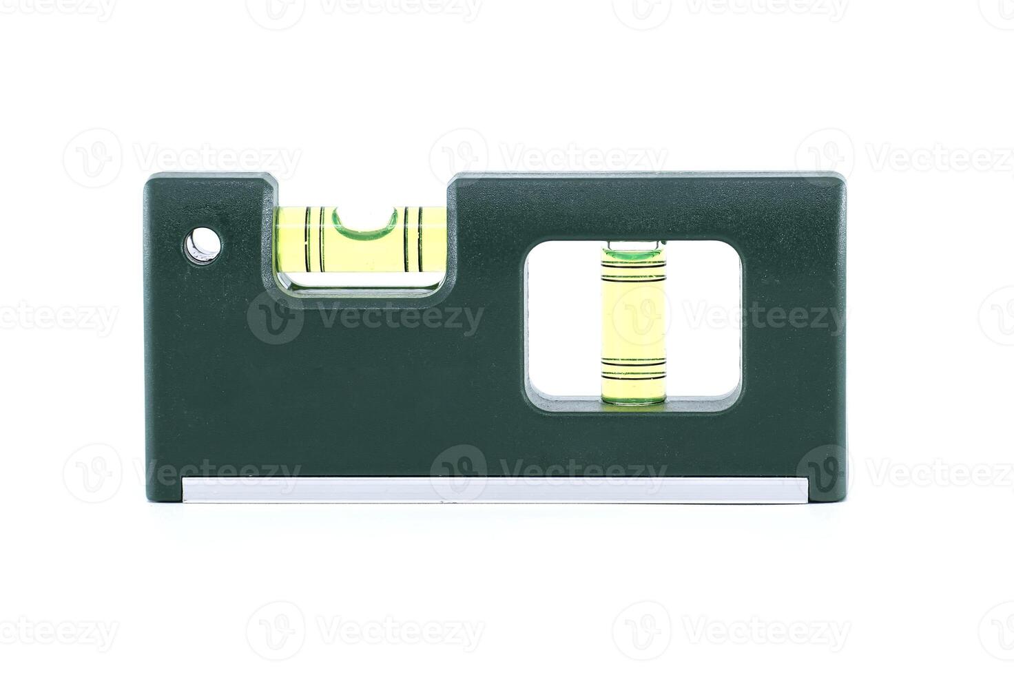 A close-up of a green level tool against a clean white background. photo