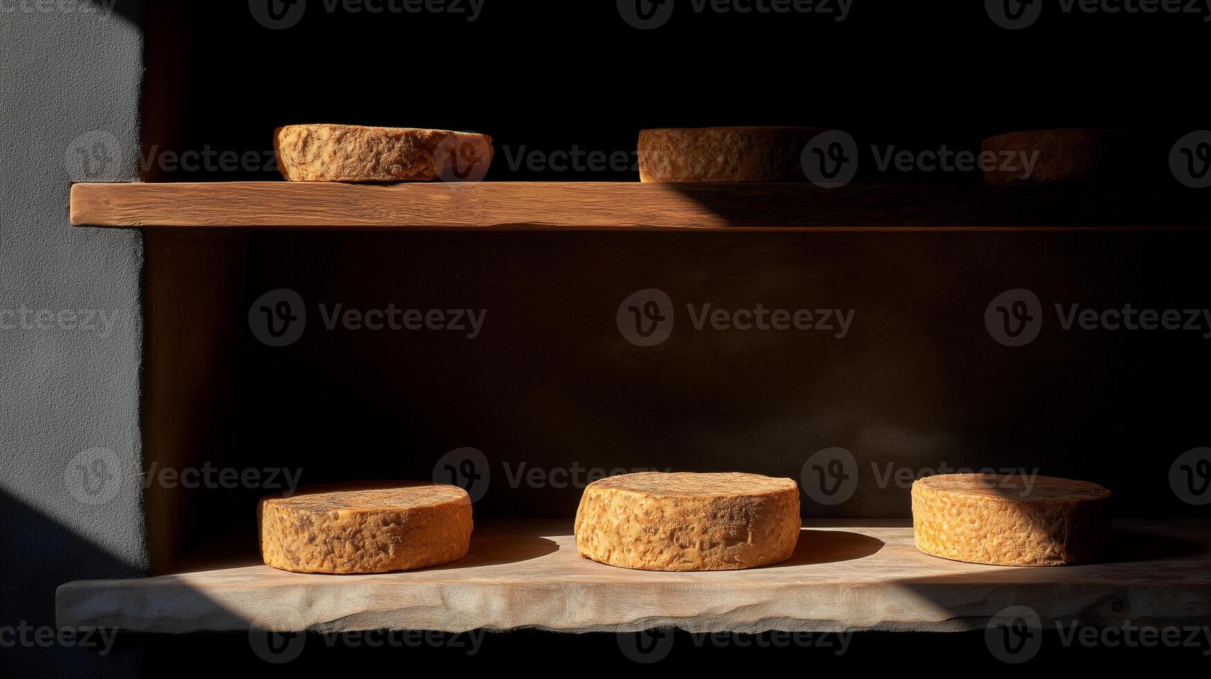 Aged artisan cheese wheels maturing on wooden shelves in traditional dairy production facility. Orange fermented cheese rounds aging in rustic farmhouse storage cellar workshop setting. photo