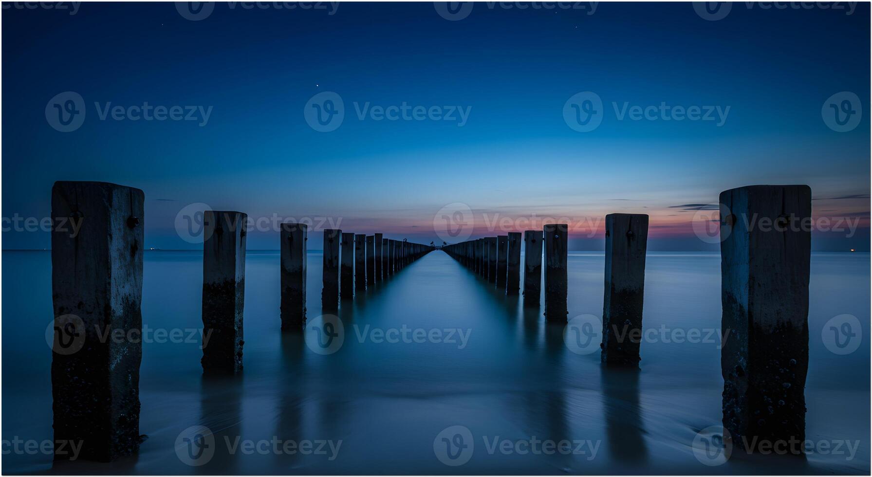 Blue Hour Long Exposure of Wooden Pier in Sapeken Indonesia photo