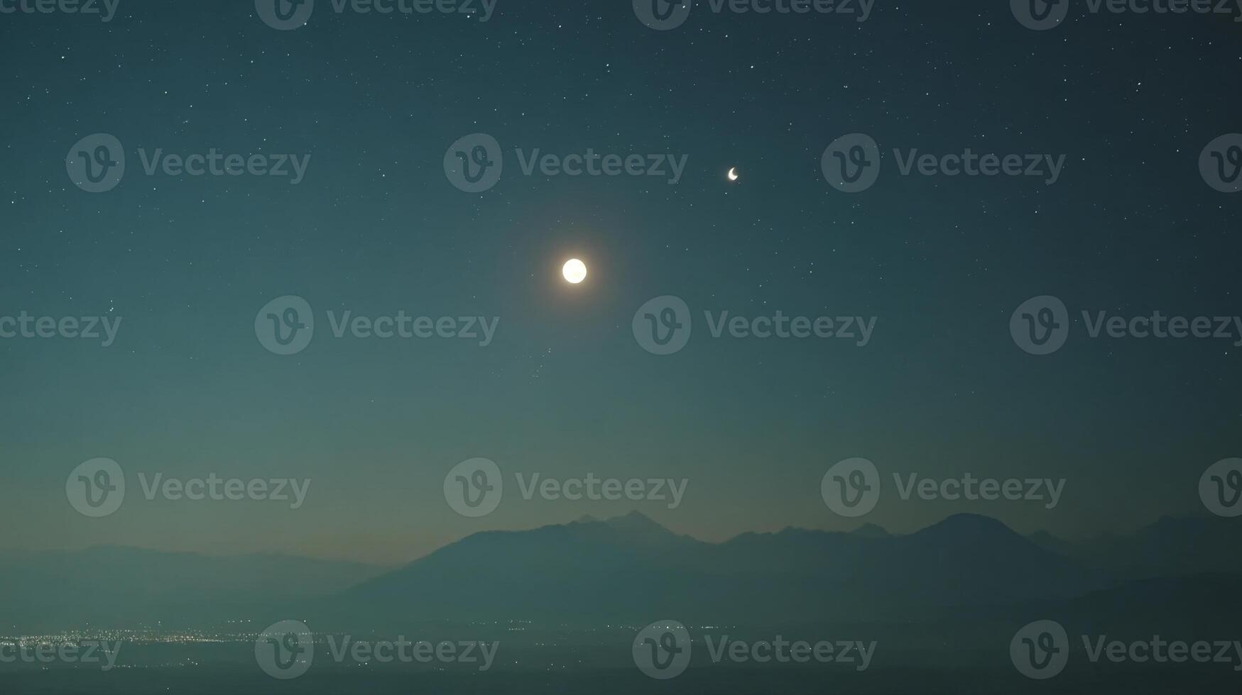 Serene Night Sky with Bright Moon and Distant Planets over Majestic Mountains and a Twinkling Starry Background photo