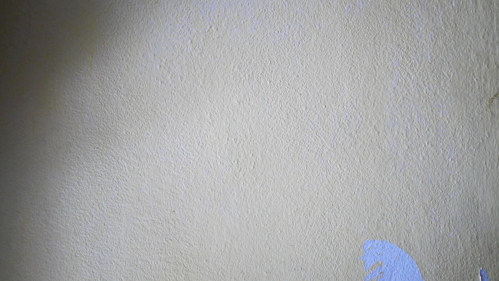 Textured Light Gray Wall with Faint Purple Stain for use as background photo