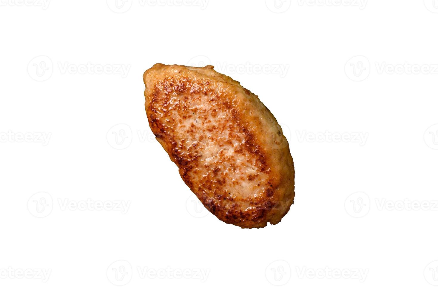 Delicious fresh fried minced fish cutlets with spices and herbs on a white background photo