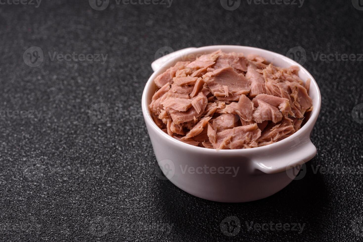 Canned tuna in a can and on a plate for making sandwiches and other food. Canned tuna photo
