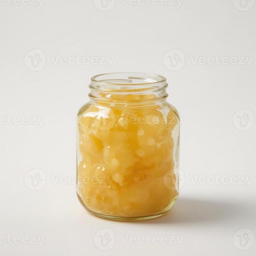 melted cheese jam in a tightly closed jar with a white background photo