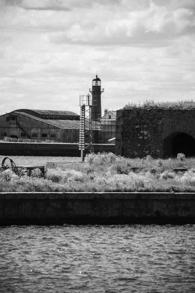 Grayscale lighthouse scenery architecture landmark structure travel view photo