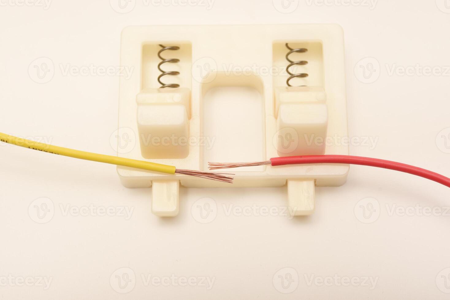 Set of professional tools for soldering and wire stripping on a workbench. Ideal for electronics repair and assembly. photo