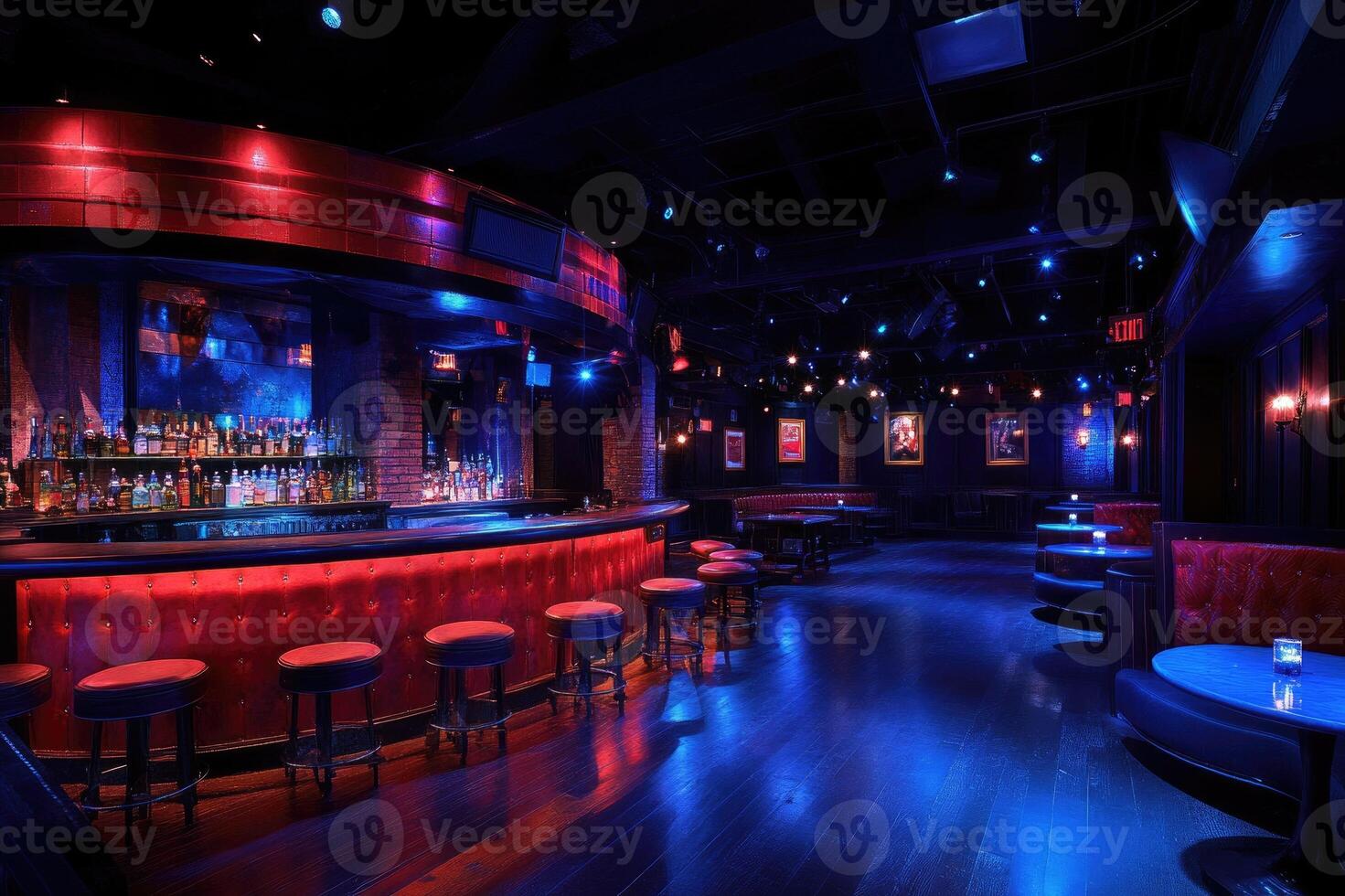 Empty bar counter and tables illuminated with blue and red lights photo