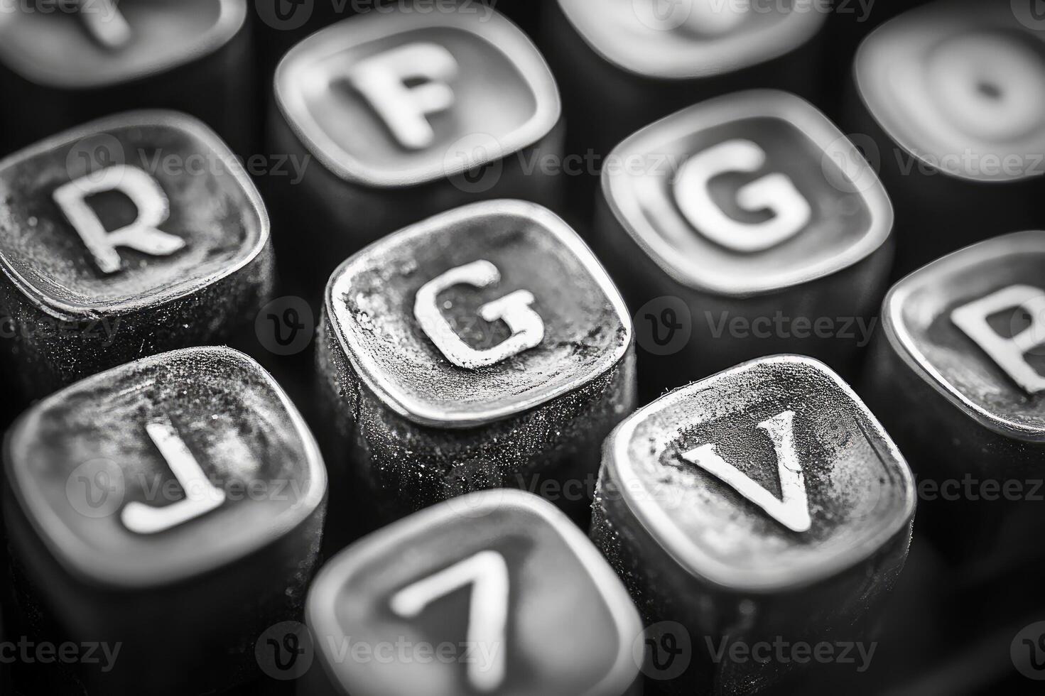 Close-up view of dusty typewriter keys showing signs of wear and tear photo