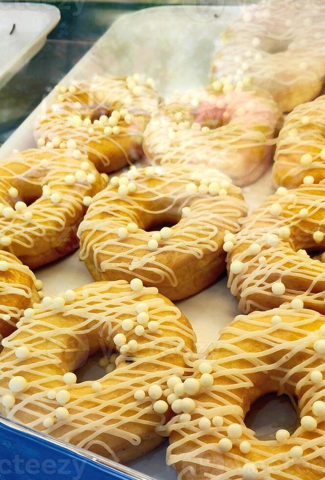 Sweet Glazed Donuts with White Chocolate Pearls photo