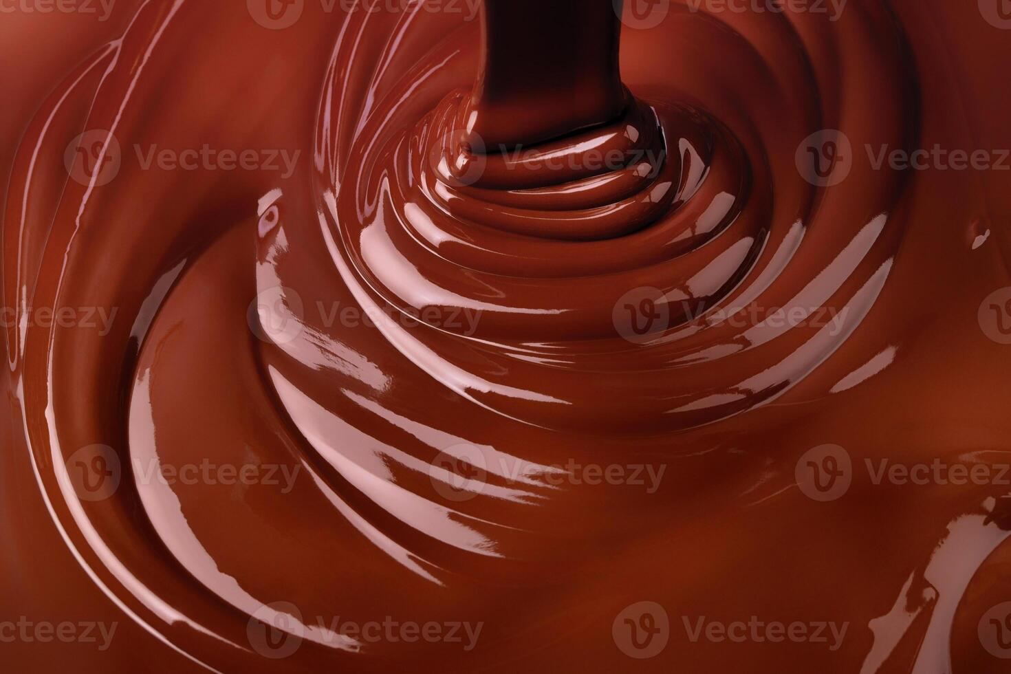 melt dark chocolate background. pour liquid cocoa dessert photo