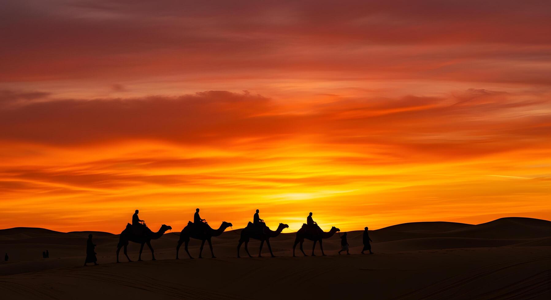 Silhouetted camel caravan in golden desert at dusk, suitable for themed presentations, travel media, or cinematic backdrops. photo
