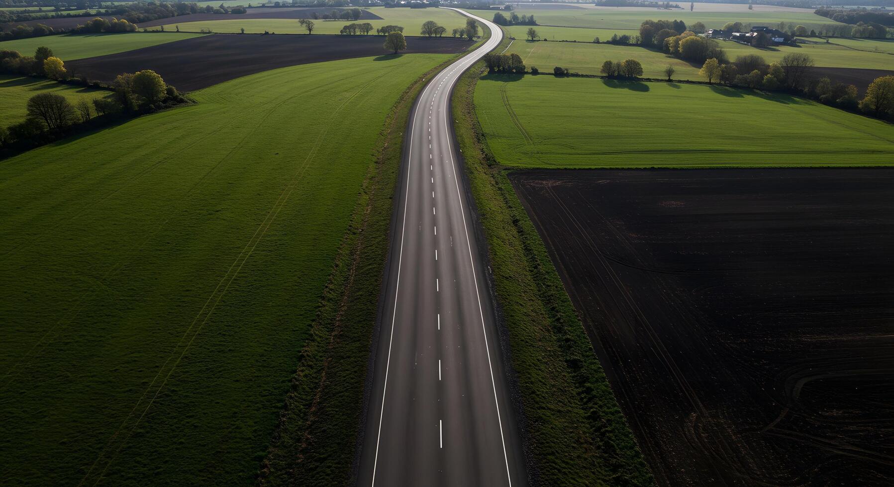 Clean top-down view of a paved road, perfect for infographic backgrounds, navigation visuals, or app interfaces. photo