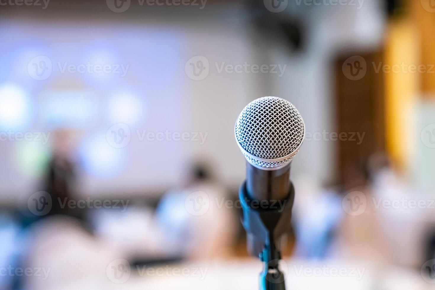 microphone is on microphone stand in seminar meeting room for everyone to use when speaking or greeting seminar participants.aa photo