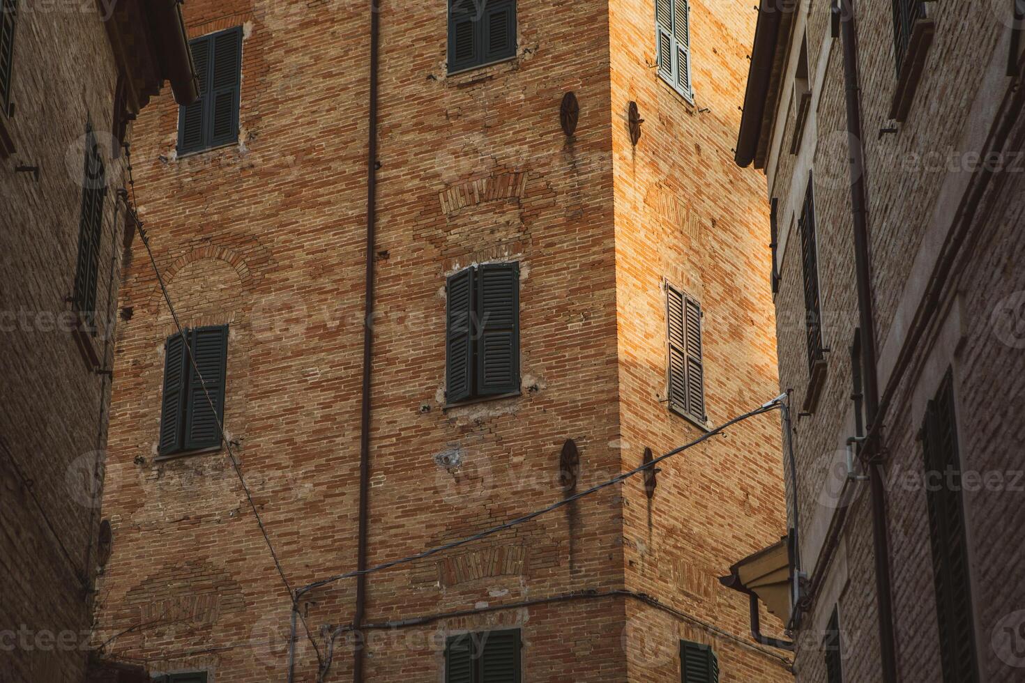 Corinaldo enchants with its narrow streets and ancient walls in italy photo