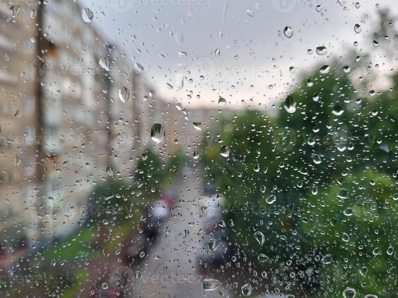Window view background with raindrops photo