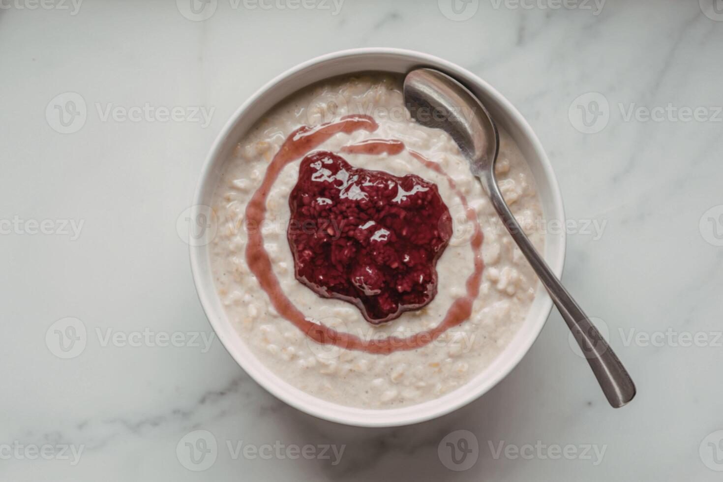 a bowl of creamy oatmeal porridge photo