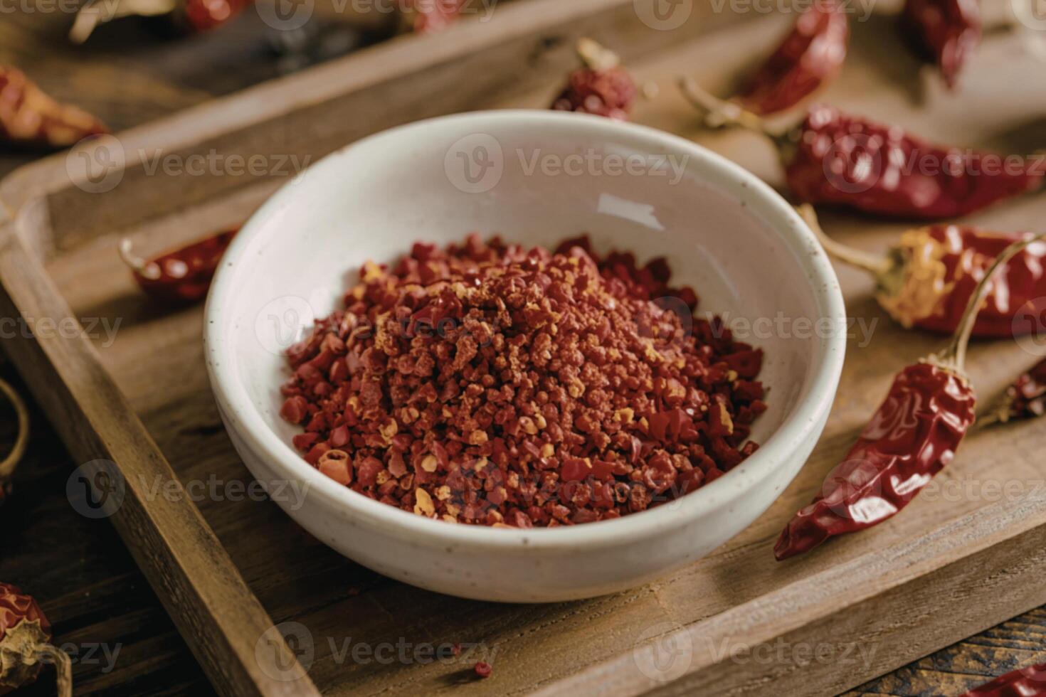 Bowl of red chili flakes photo
