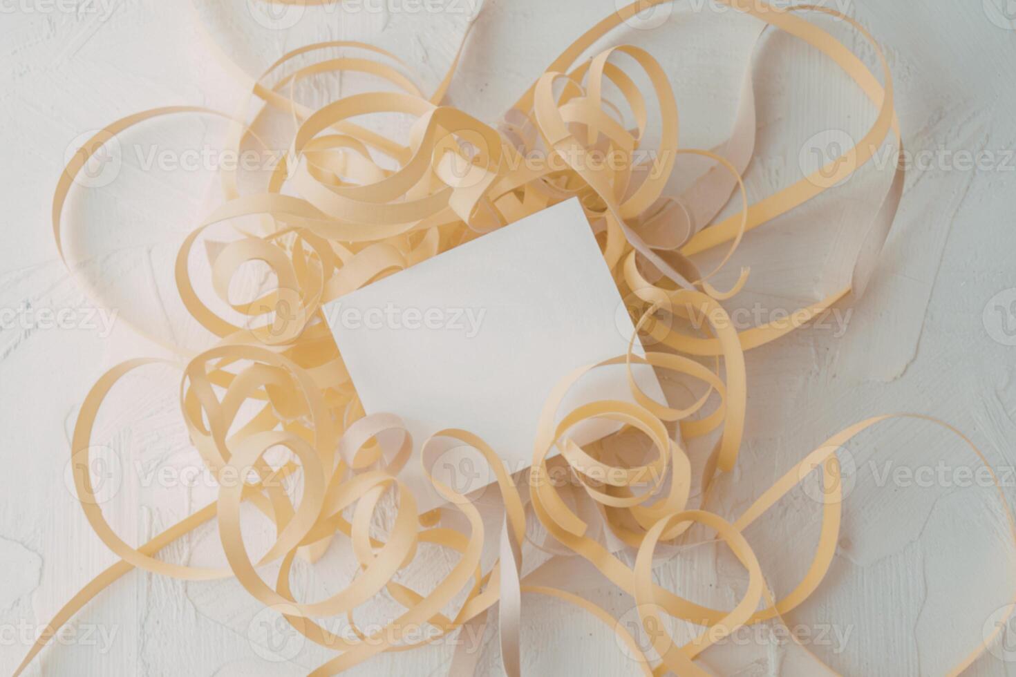 A piece of paper surrounded by yellow ribbons photo