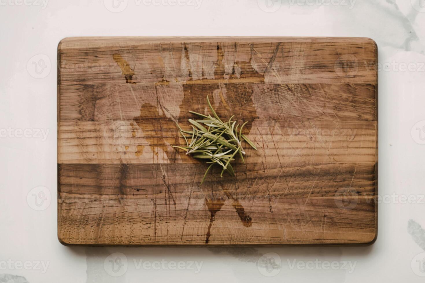 a well-worn acacia wood cutting board photo