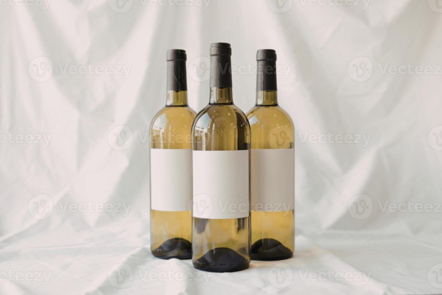 three empty wine bottles photo