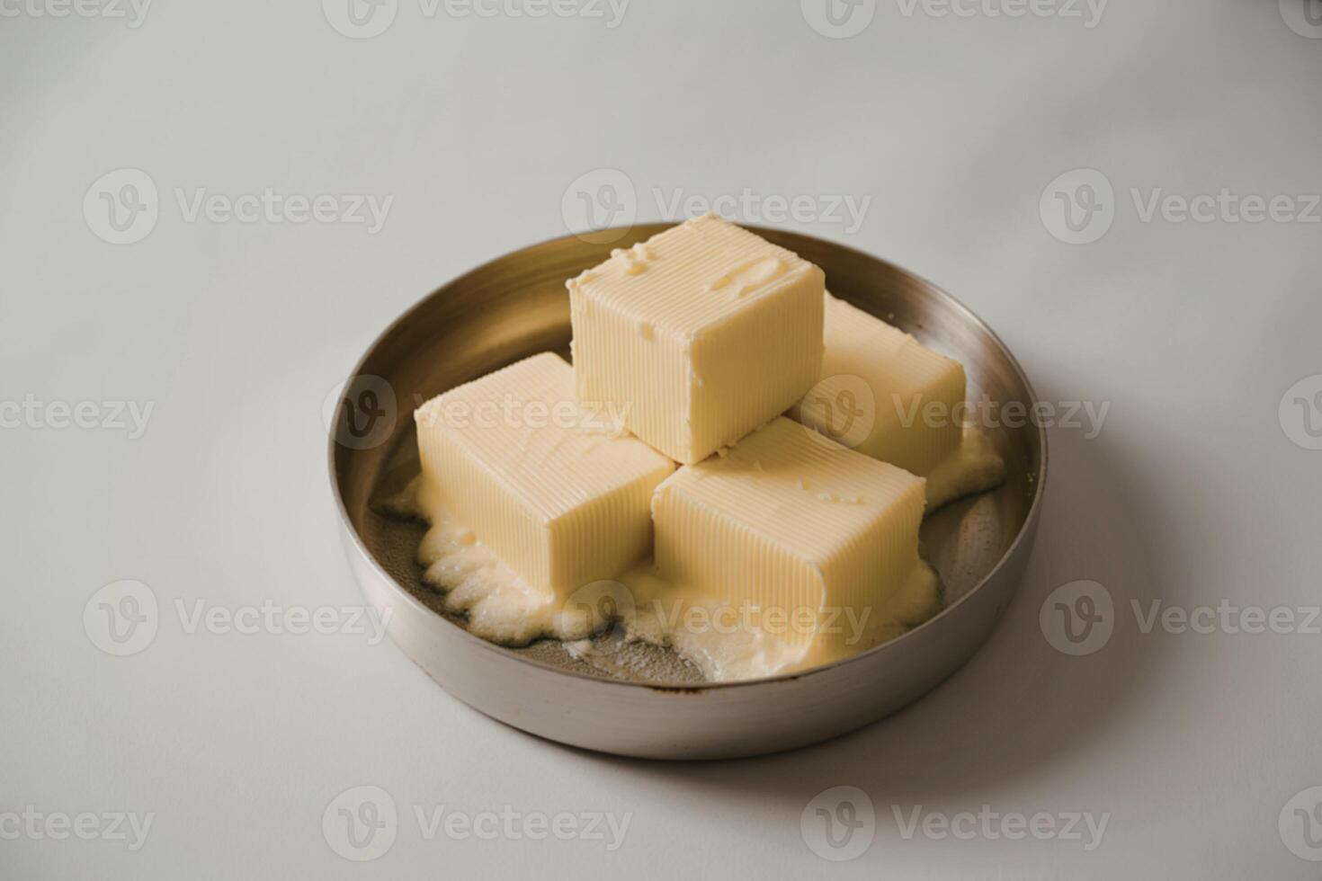 a close-up view of glistening, golden butter photo