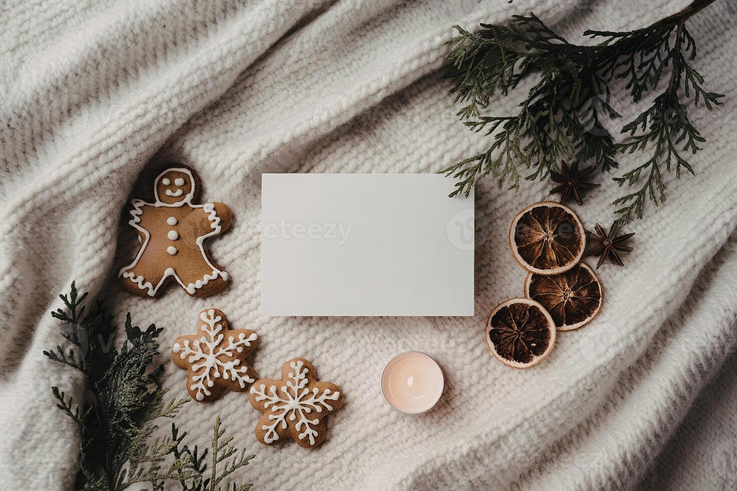 A flatlay composition of a Christmas scene on a white textured background photo