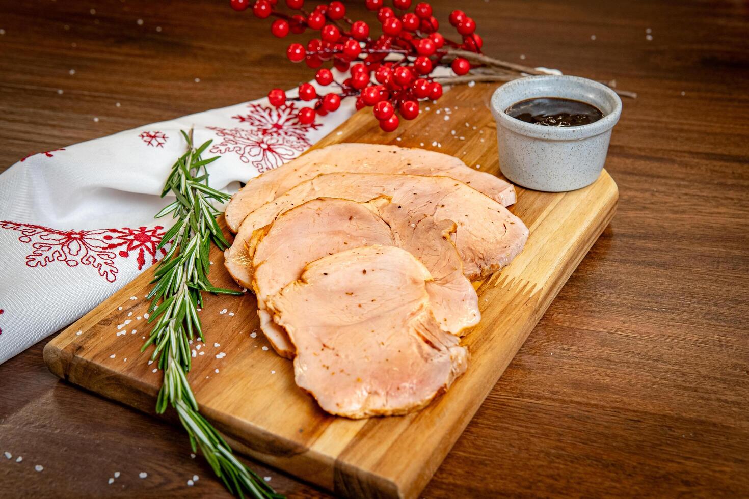 Christmas turkey slices with festive decoration. photo