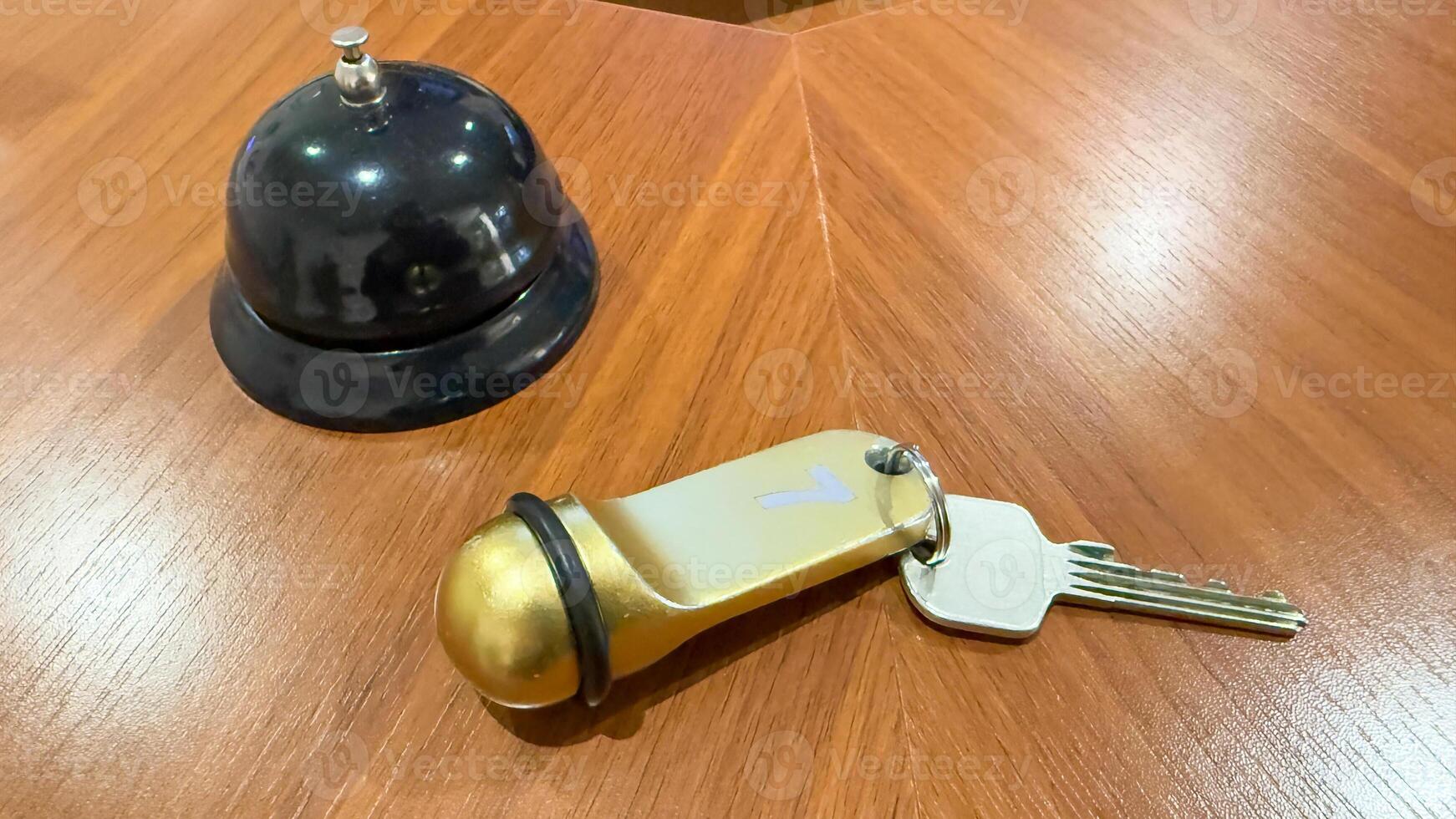 Hotel keys whisper untold stories beside a polished bell, evoking Adventure Booking Days mystical check in rituals photo