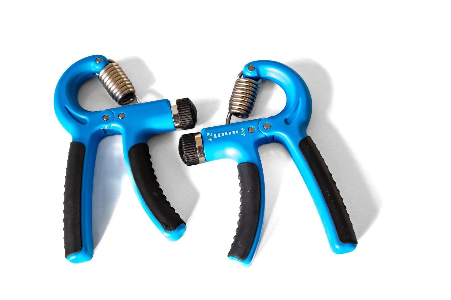 Blue hand grippers for strength training and exercise double photo