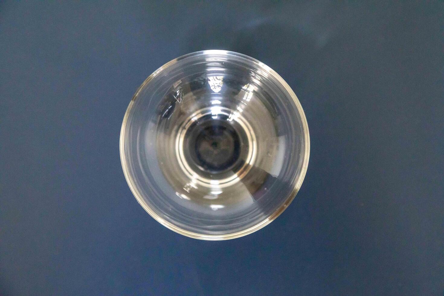 Elegant Clear Glass Bowl on a Dark Surface 2 photo