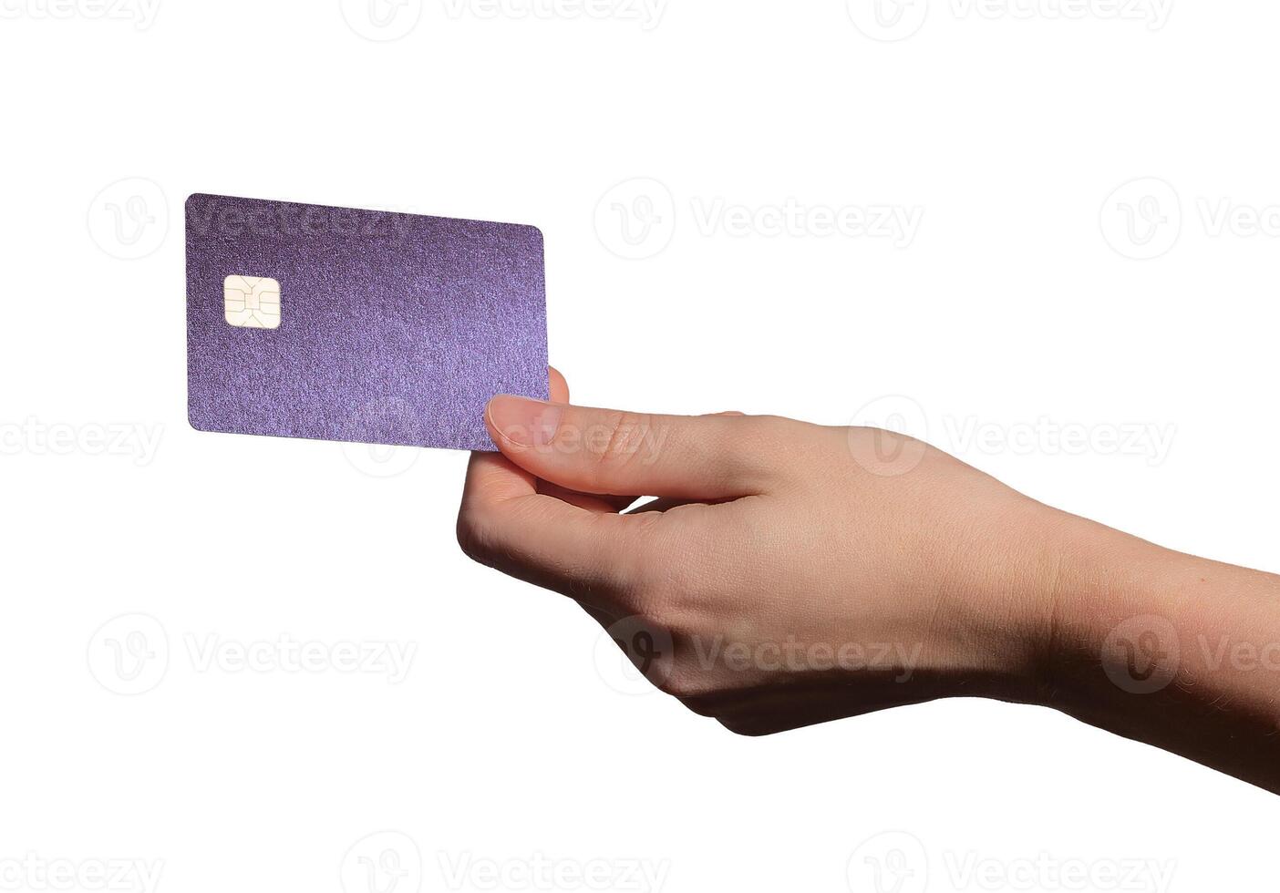 Bank card sale concept. Violet grainy plastic card with chip held in hand for credit, debit, photo