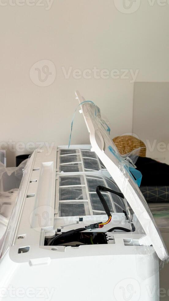 Deconstructed air conditioner undergoing repair dances with thermal efficiency dreams, capturing DIY spirit and Earth Days eco conscious whispers photo