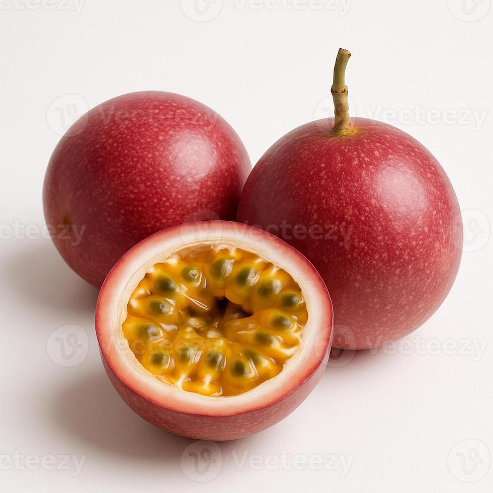 Ripe passion fruits, one halved to reveal vibrant yellow pulp and seeds, showcase exotic flavor and tropical freshness. photo