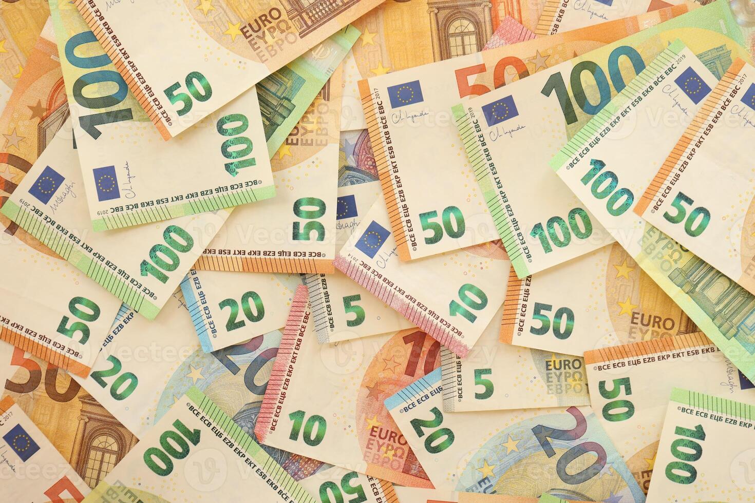 Pile of euro paper banknotes as background photo