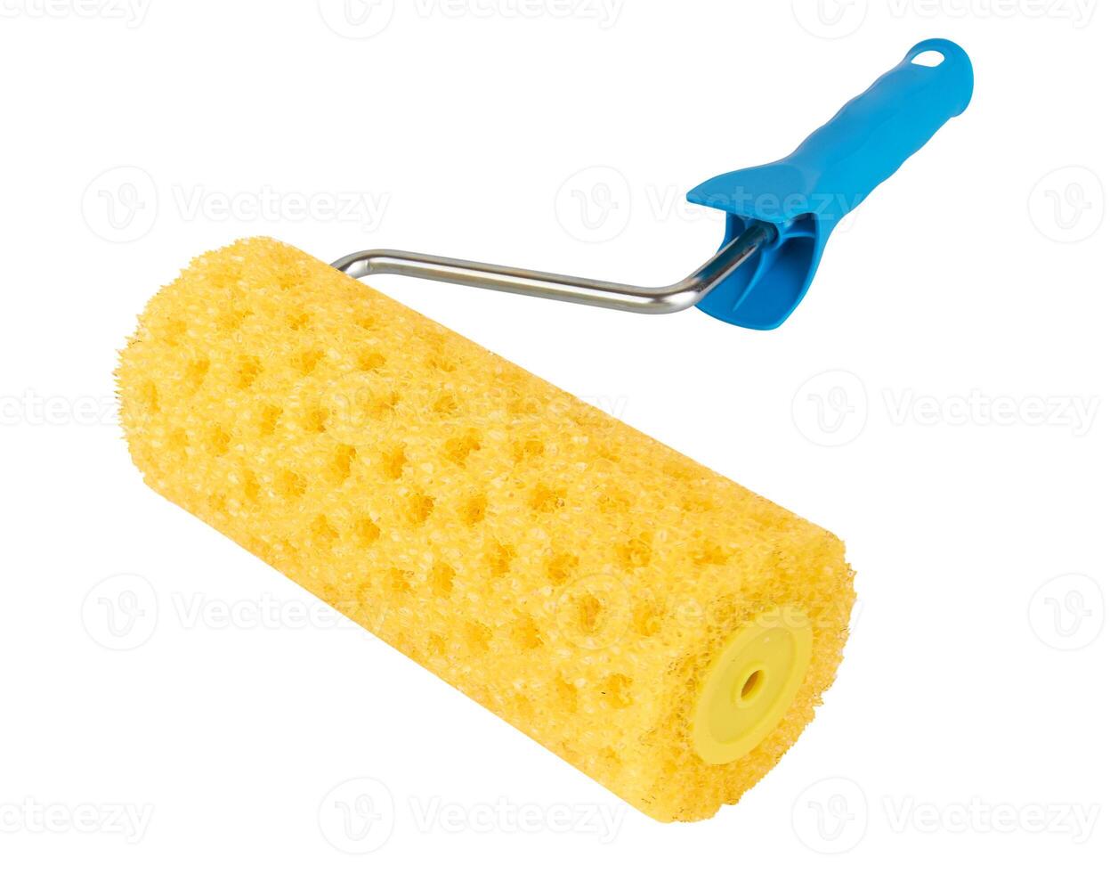 Paint roller on white photo
