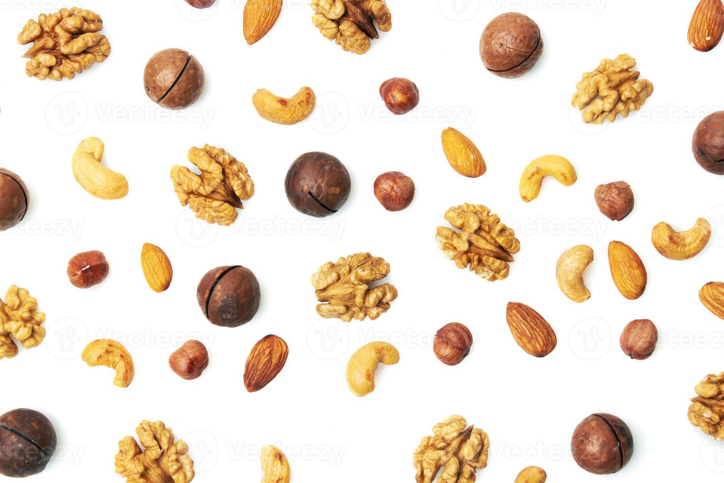 Pattern of nuts mix isolated on white photo