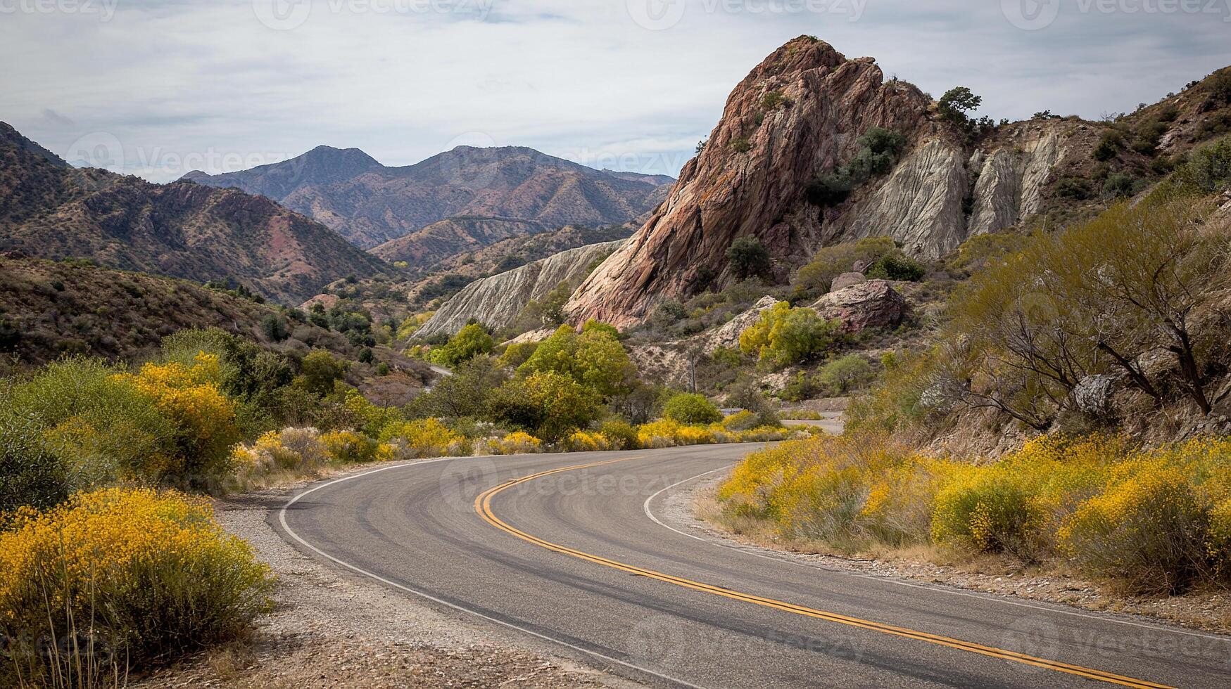 Winding road in colorful mountain landscape photo