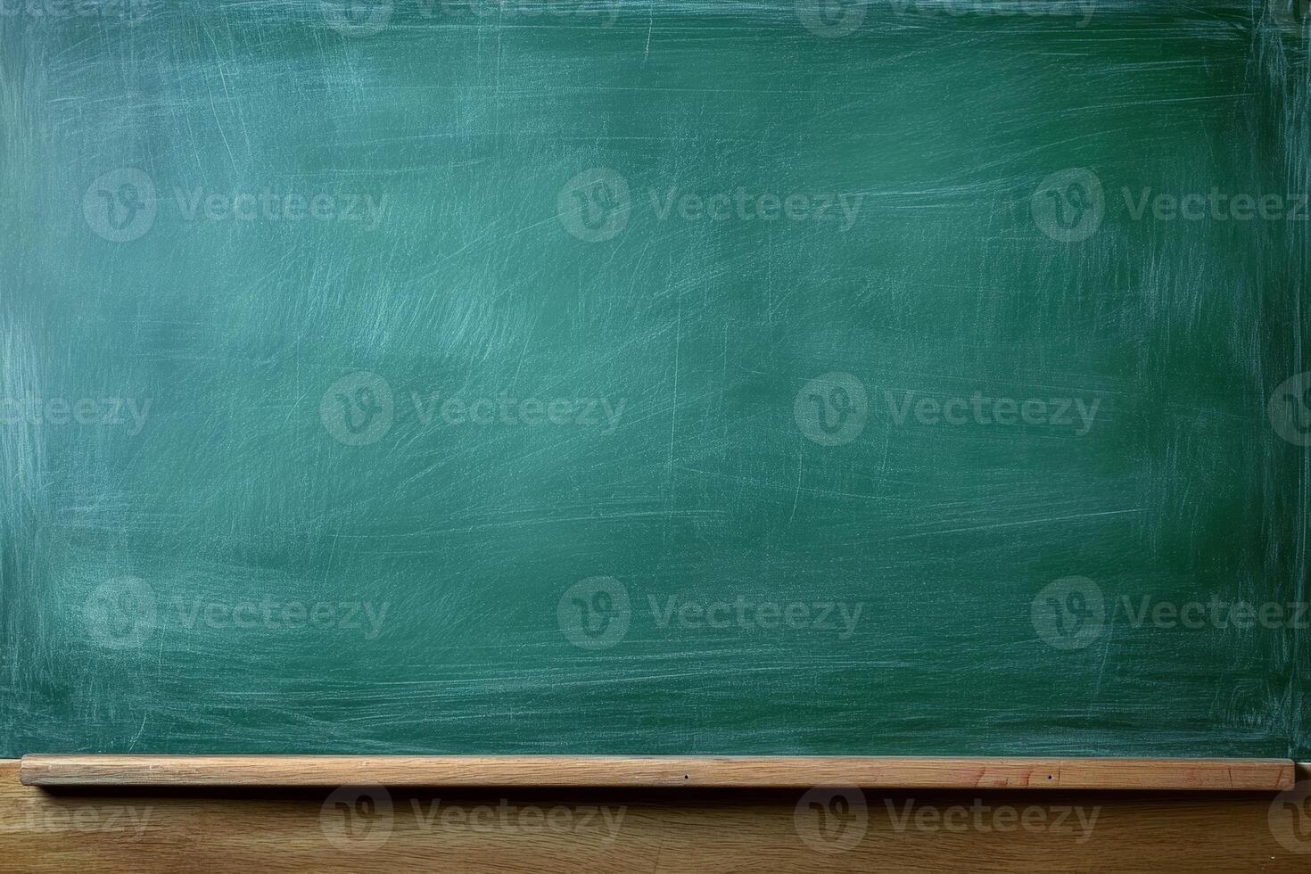Smooth blank green chalkboard provides an ideal surface for notes, diagrams, or lessons in classrooms or study areas photo