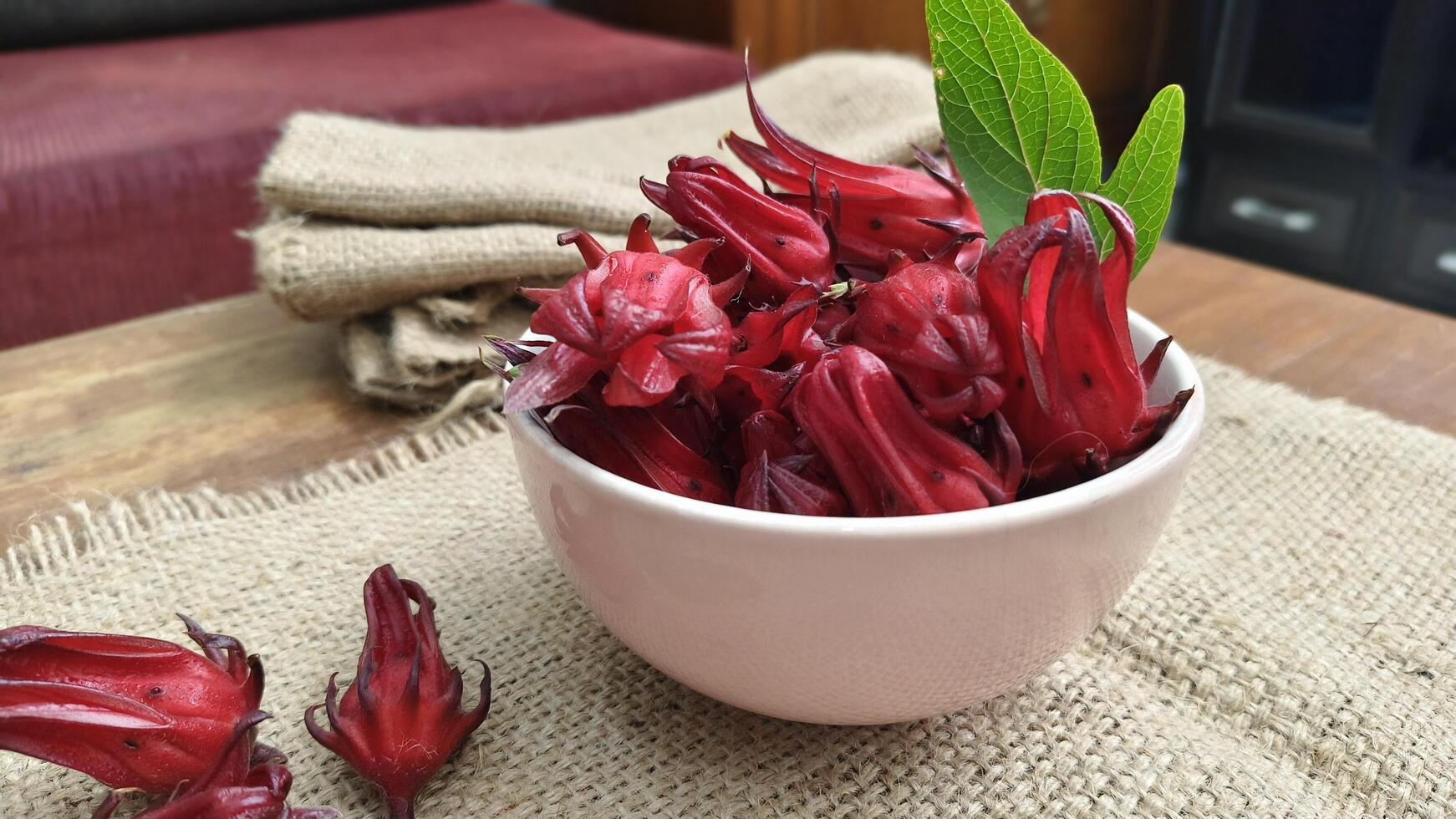 Bowl of fresh hibiscus flowers photo
