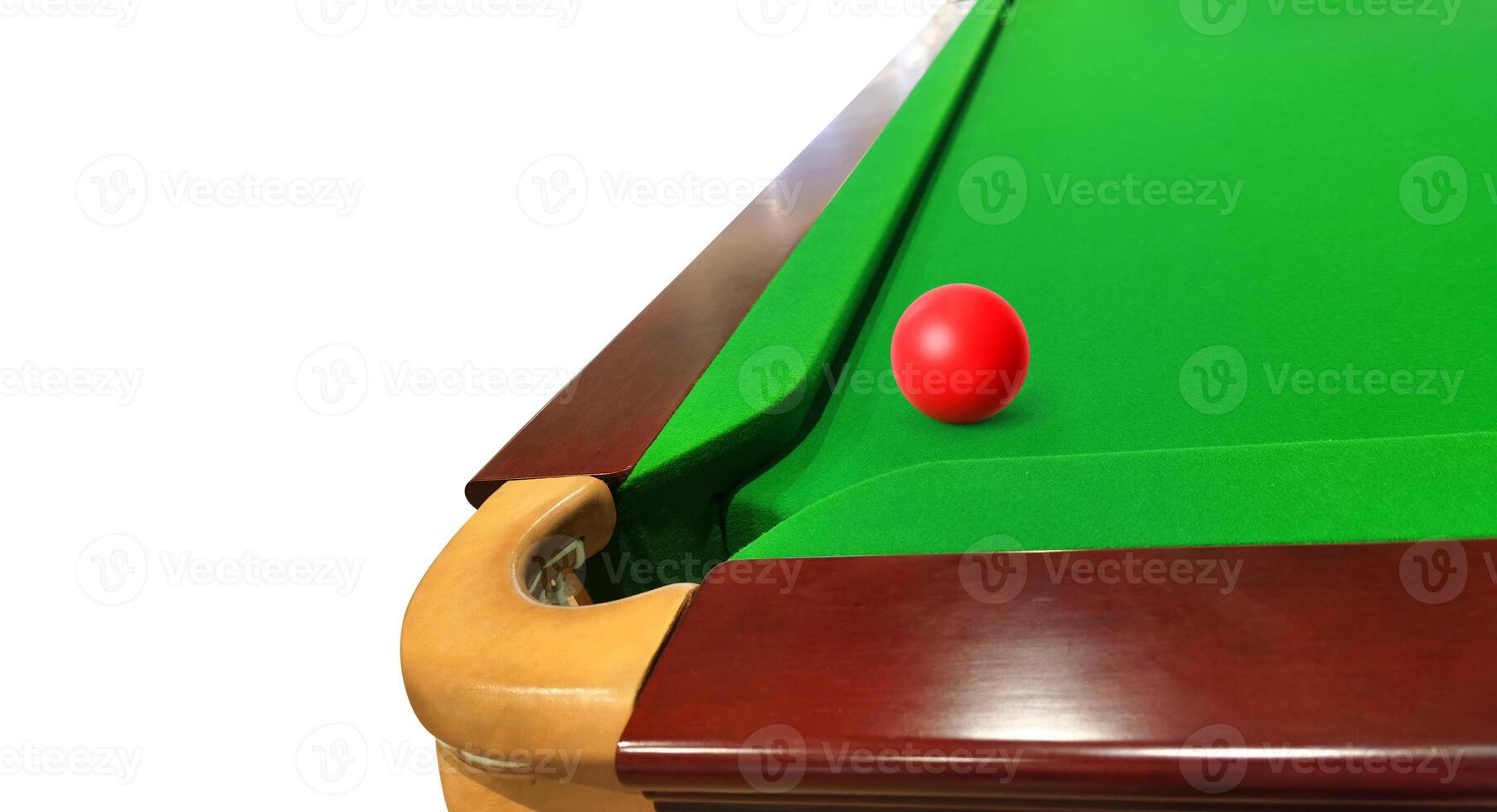 Green felt snooker table corner with red snooker balls on the table. photo