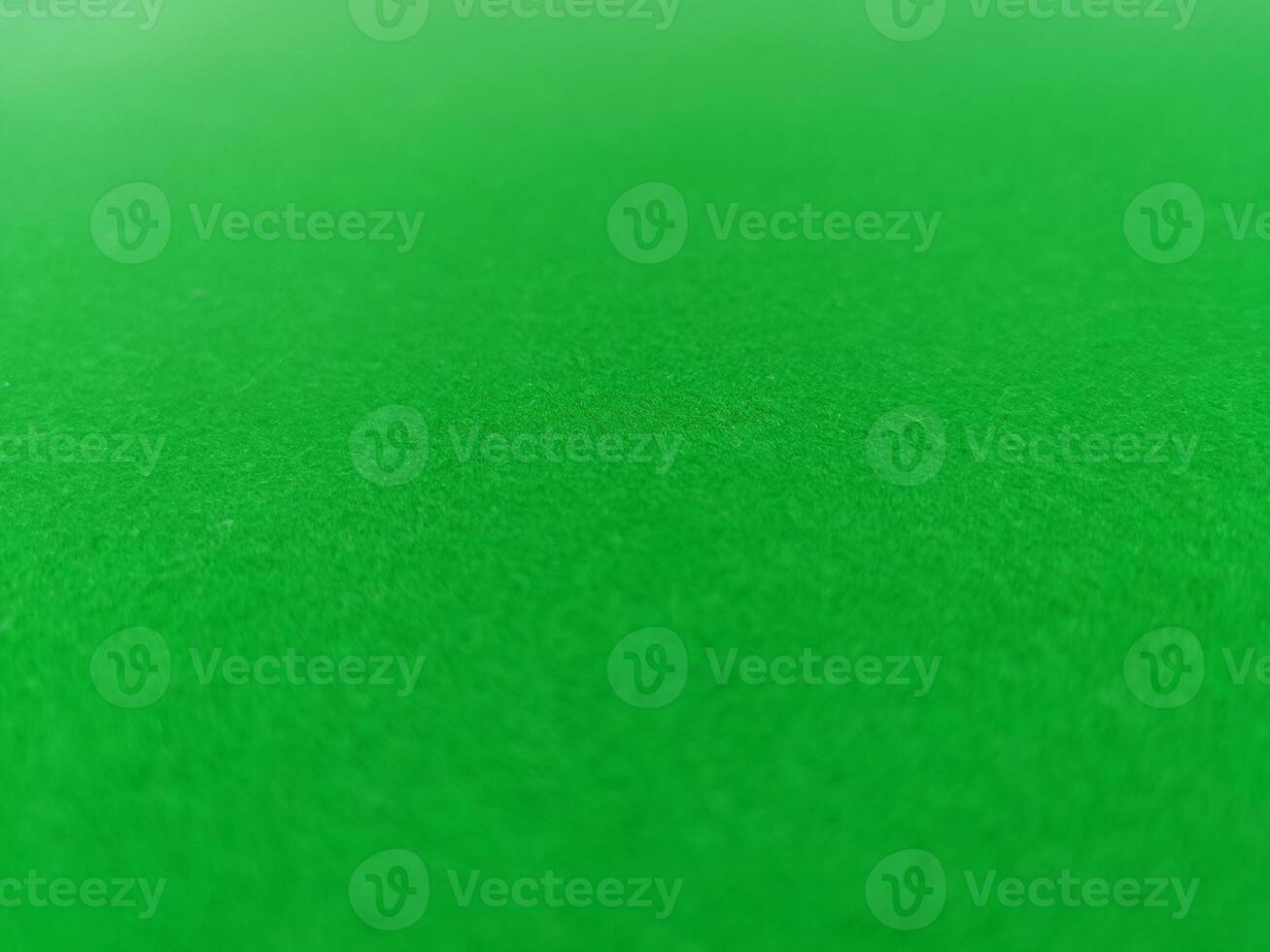 Green felt floor empty snooker table. photo