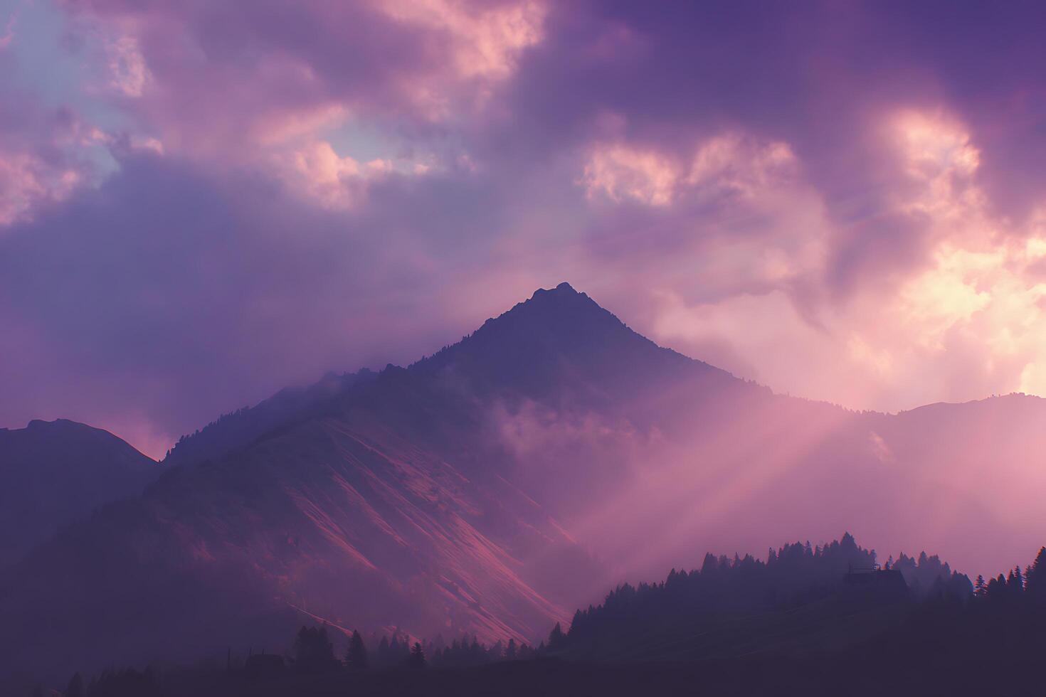 A mountain with sun rays shining through the clouds photo