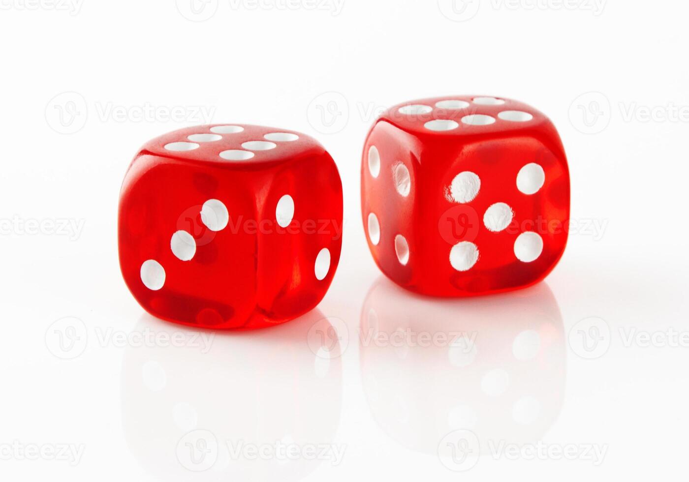 Red and white dices on white photo