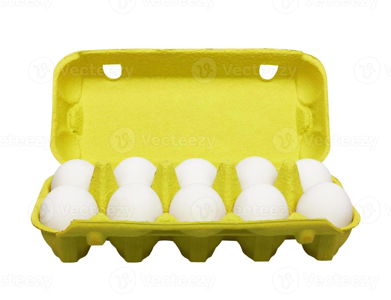 Cardboard egg box with eggs on white photo